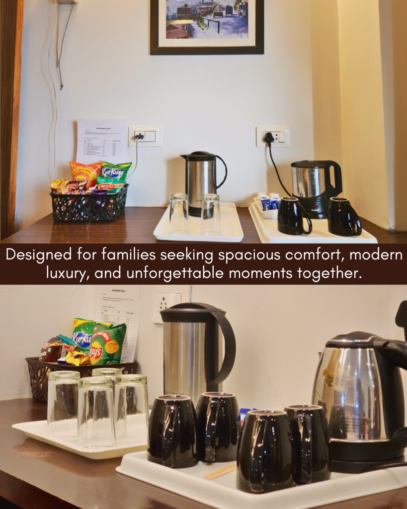King’s Family Suite Tea and refreshment setup with electric kettle, cups, glasses and snacks in King’s Family Suite