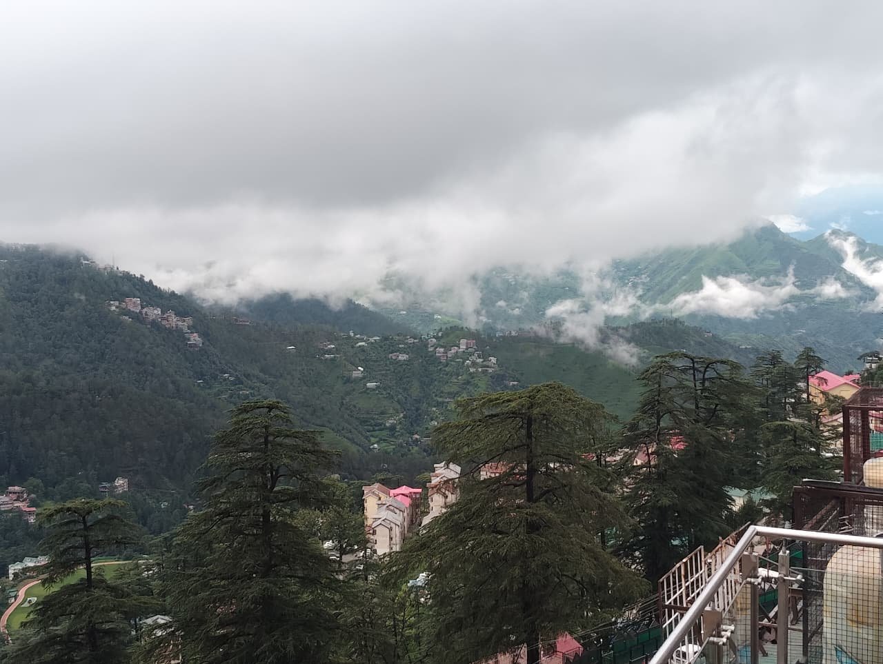 Scenic mountain view at Hotel Surya Shimla in monsoon